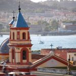 Church bell tower overlooking the Bay of Naples