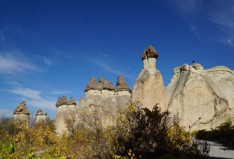 Fairy chimneys against a blue sky in Cappadocia